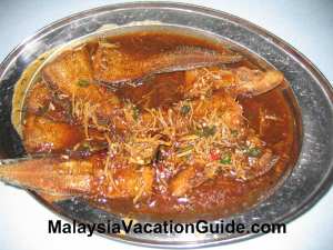 Fish with sauce at Restoran Suang Le River