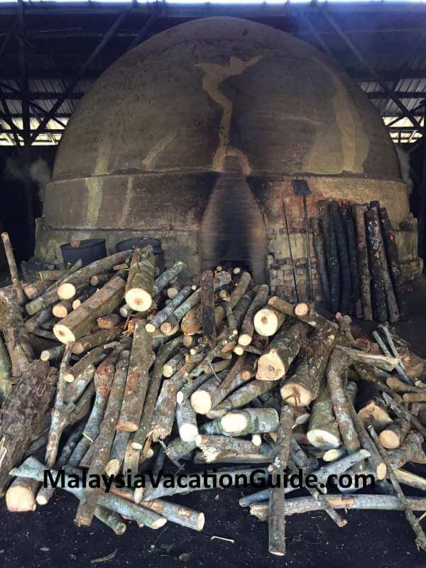 Charcoal processing Kuala Sepetang