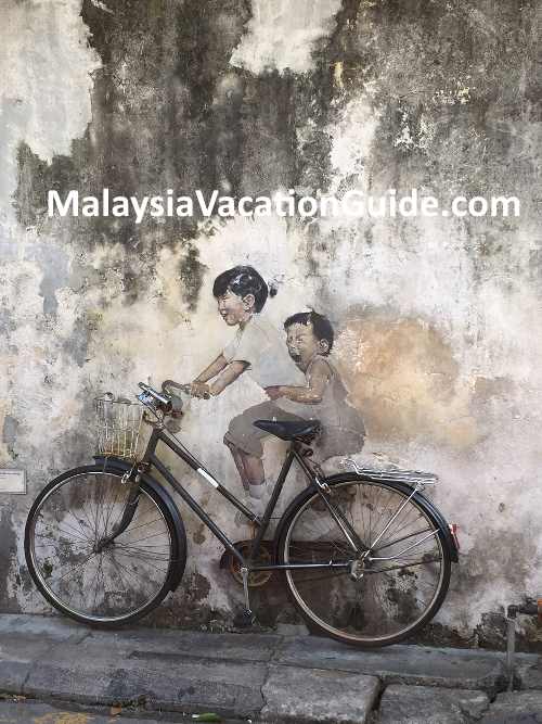 kids on bicycle penang lebuh armenian